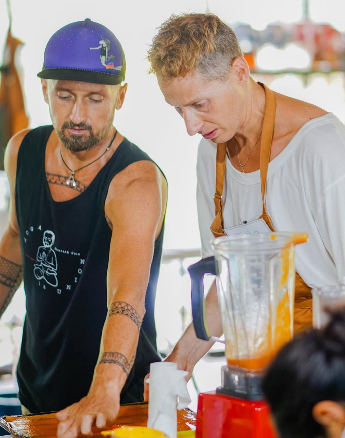 Ben demonstrating raw food preparation