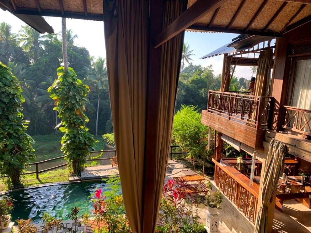 Gaia Retreat Center overlooking its pool and the Ubud jungle